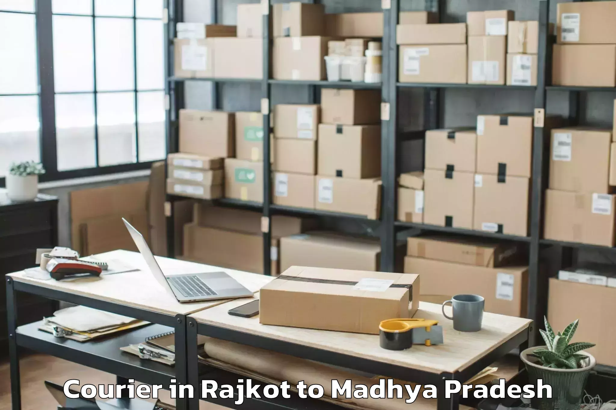 Reliable Rajkot to Isagarh Courier